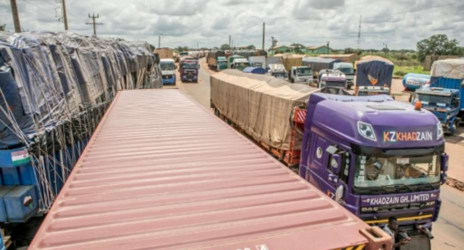 The fallout from sanctions against Niamey over the July coup included trucks stuck at Benin's closed border with Niger in September.  By - AFPFile