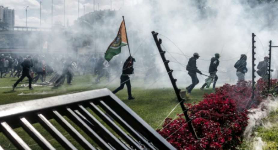 The families of victims and activists have called for peaceful demonstrations to mark a year since the deadliest day of the unrest when parliament was invaded.  By LUIS TATO (AFP/File)