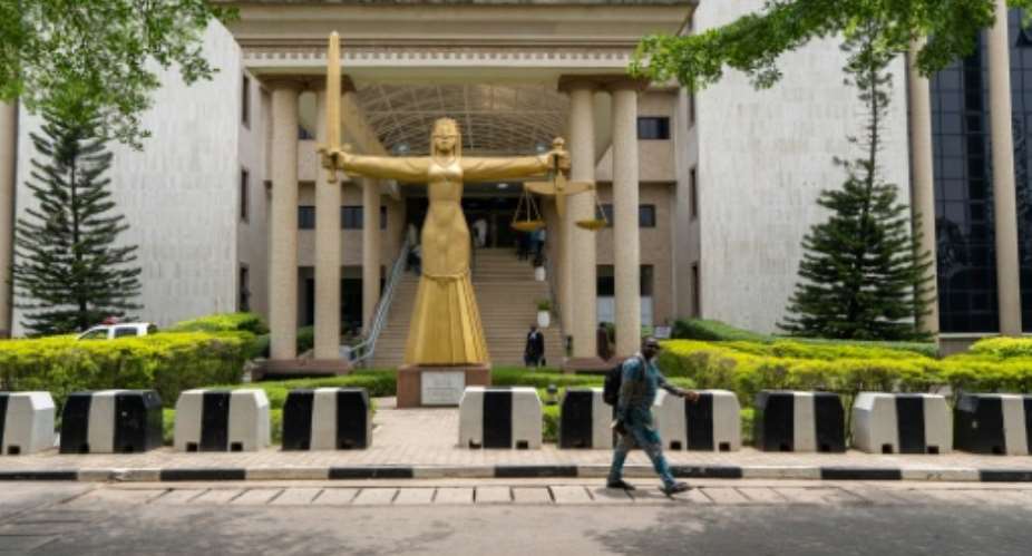 The Federal High Court in Abuja is hearing the trial of civilians allegedly linked to the coup.  By Light Oriye Tamunotonye (AFP)