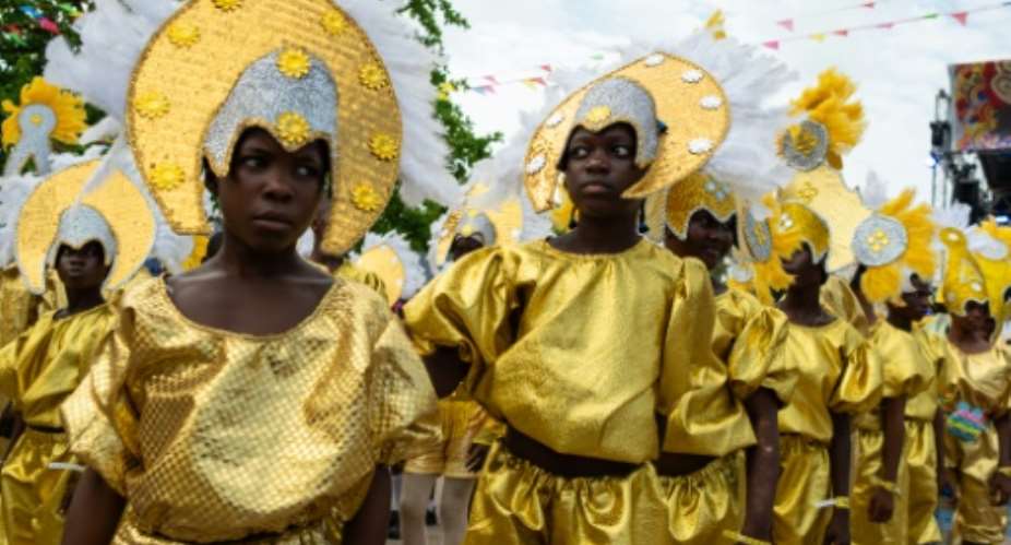 The festival helps to keep their heritage alive and celebrate the citys Afro-Brazilian history.  By TOYIN ADEDOKUN (AFP)