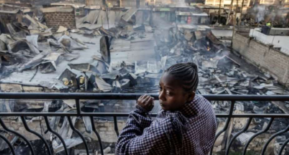 The fire left a trail of destruction in the Nairobi area of Embakasi.  By LUIS TATO AFP