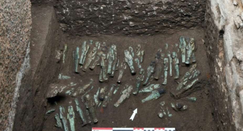The funerary figurines discovered inside a tomb of the ancient Egyptian capital of Tanis.  By Simone NANNUCCI (MFFT - EPHE/PSL/AFP)