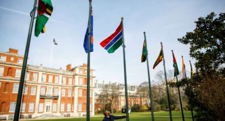 The Gambia's flag was raised in a ceremony at Marlborough House, the Commonwealth Secretariat's headquarters in London.  By Tolga Akmen AFP