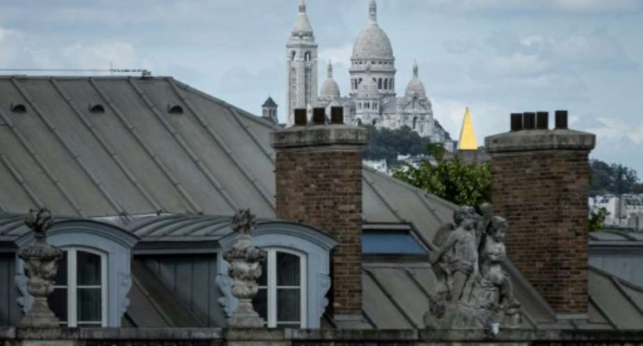 The Goutte d'Or is a stone's throw from the emblematic artists' quarter of Montmartre and its famous Sacre Coeur basilica in Paris's touristy 18th arrondissement, but a world apart.  By JOEL SAGET AFPFile