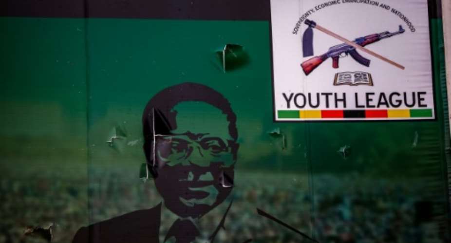 The influential youth league of Zimbabwe's ruling party has called for Robert Mugabe to leave office and his wife Grace to be thrown out of the party.  By Jekesai NJIKIZANA AFP