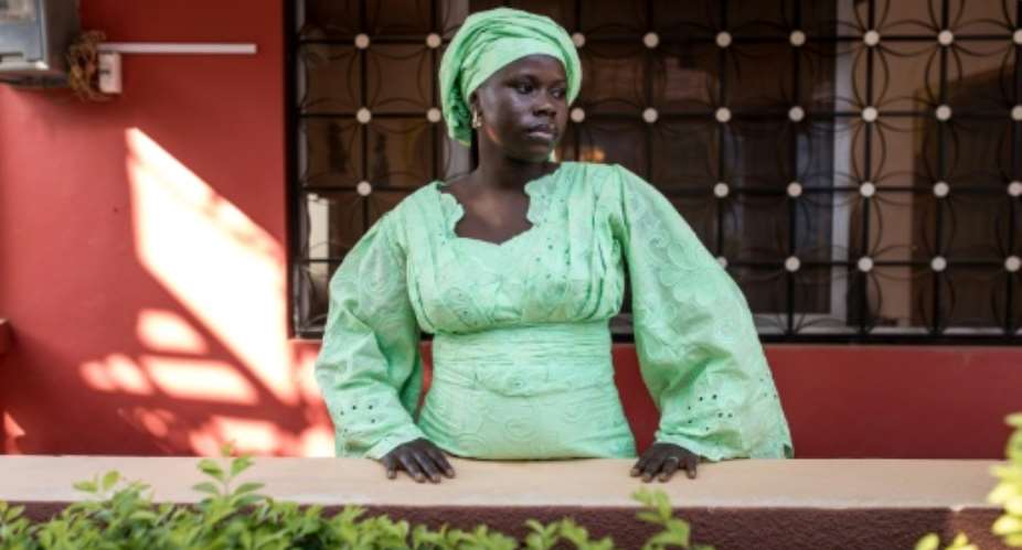 The injuries Mariama Fatajo suffered during childbirth due to FGM were so serious she wants no more babies.  By MUHAMADOU BITTAYE (AFP)