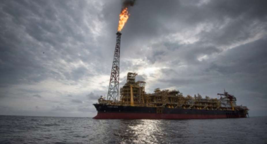 The Kaombo Norte has been anchored off the northern coast of Angola for three months and has recently begun to pump up crude oil from the depths below.  By Rodger BOSCH AFP