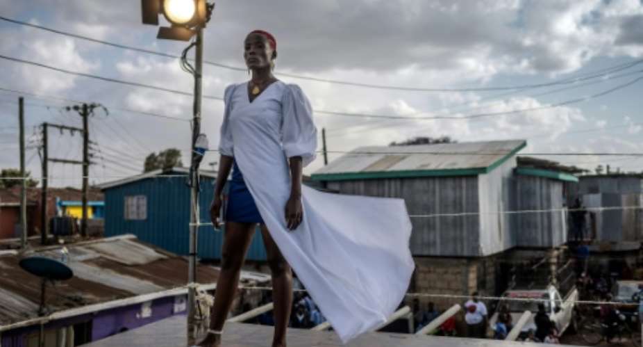 The Kibera catwalk overlooks the rooftops of the massive slum.  By LUIS TATO (AFP)