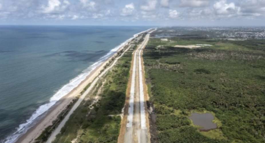 The Lagos-Calabar Coastal Highway runs parallel to the Atlantic Ocean -- and too close for comfort, critics say.  By OLYMPIA DE MAISMONT (AFP)