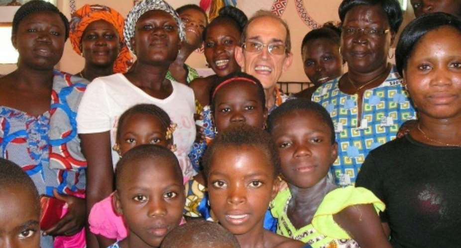 The late Spanish Salesian priest Antonio Cesar Fernandez back, 3rd from R appears in this 2015 picture taken in Korhogo, Ivory Coast.  By - SALESIANS OF DON BOSCO ORDERAFP
