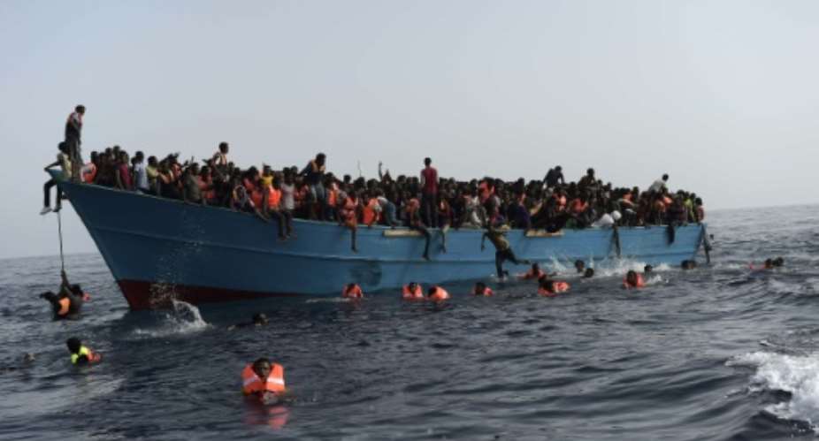 The Libyan coast guard has recently begun carrying out its own operations at sea, towing migrant dinghies headed for Europe back to shore and locking up those recovered in centres which are renowned for human rights abuses.  By ARIS MESSINIS AFPFile