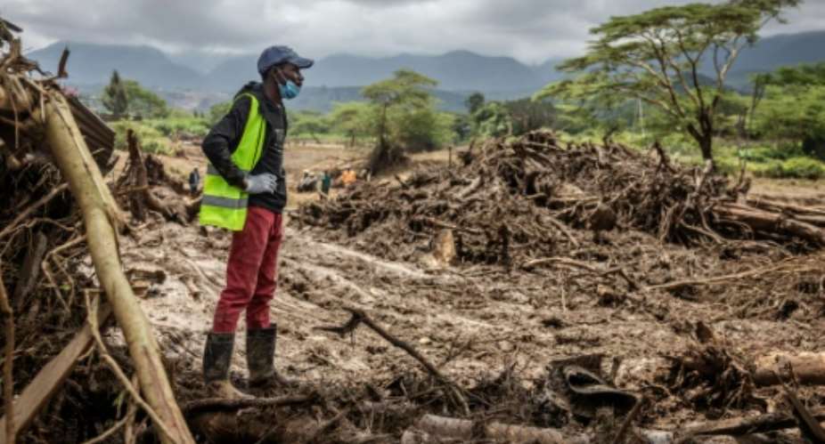 The makeshift dam burst in the Rift Valley sent torrents of water and mud gushing down a hill.  By LUIS TATO (AFP)