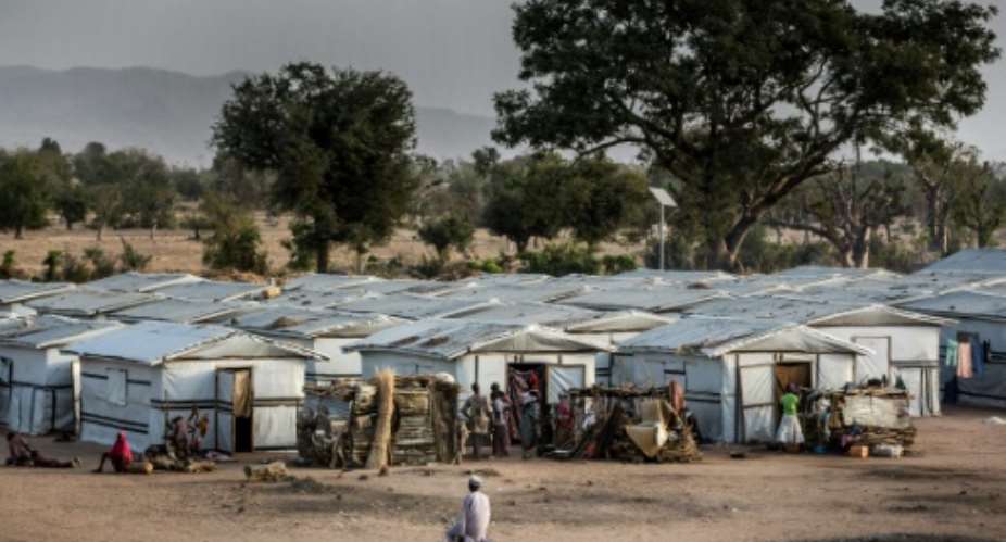 The Malkohi camp today is made up of rows of shacks separated by dirt paths, on which barefoot children and turkeys strut.  By Luis TATO AFP