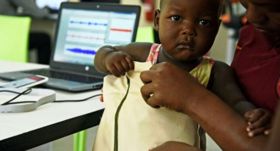 The Mama-Ope Mother's Hope kit, invented by Ugandan engineers, is a biomedical smart jacket and a mobile phone app that diagnoses pneumonia faster than a doctor.  By ISAAC KASAMANI AFP