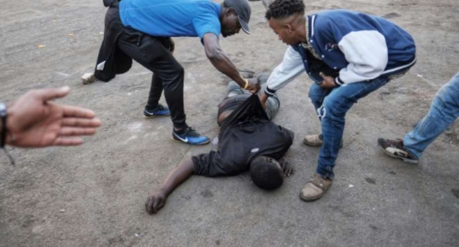 The man was fatally shot in the stomach during protests over alleged election fraud.  By MARCO LONGARI AFP