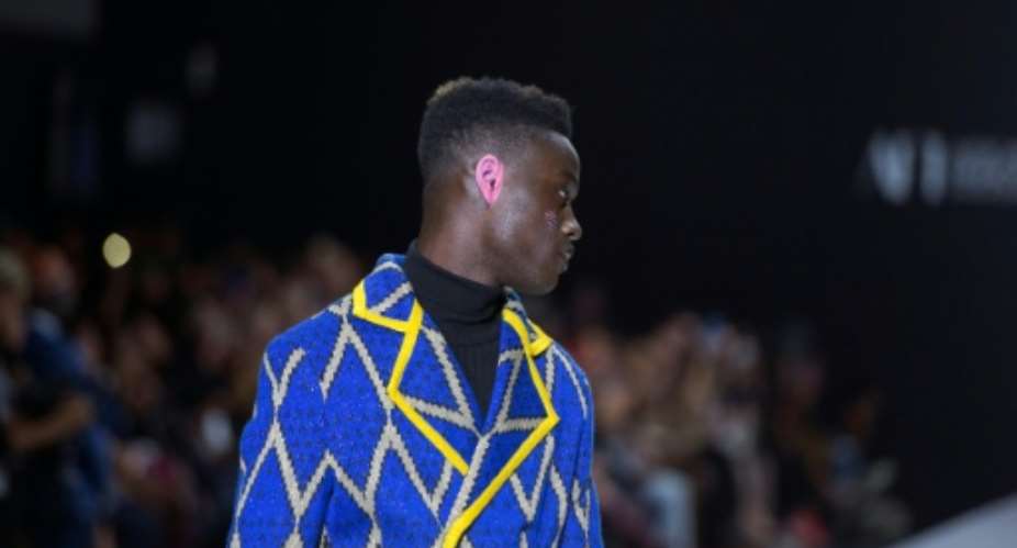 The MaXhosa Africa label (here in 2019) showcases South African culture and Xhosa traditions.  By RODGER BOSCH (AFP)
