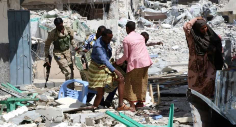 The Mogadishu attack, which killed 20 and injured more than 100, was the latest in a long line of bombing and assaults claimed by the Al-Qaeda-linked group.  By Abdirazak Hussein FARAH AFP