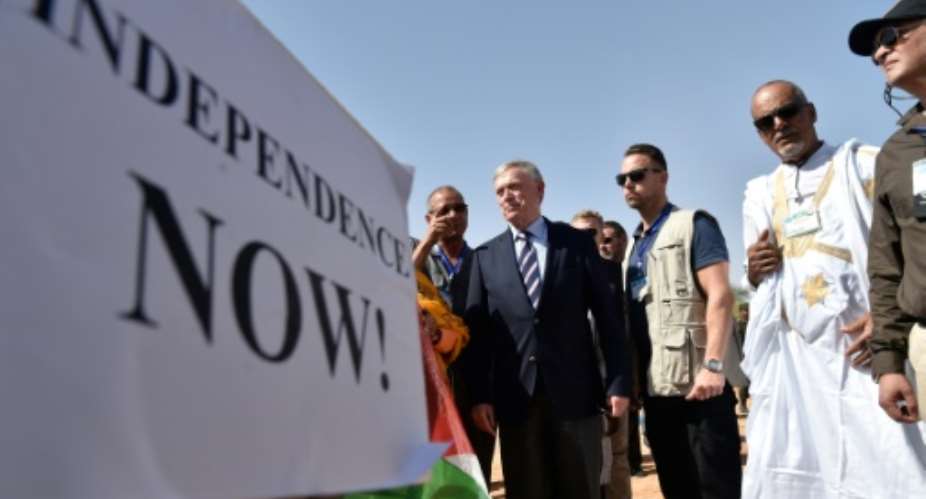 The new UN envoy for the disputed territory of Western Sahara, Horst Koehler C visits the Aousserd camp for Sahrawi refugees on the outksirt of Tindouf..  By RYAD KRAMDI RYAD KRAMDIAFP