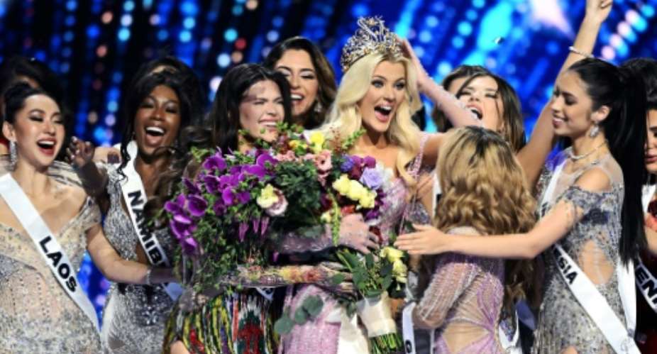 The newly crowned Miss Universe 2024, Victoria Kjaer Theilvig (C) from Denmark is a dancer and animal rights activist.  By CARL DE SOUZA (AFP)