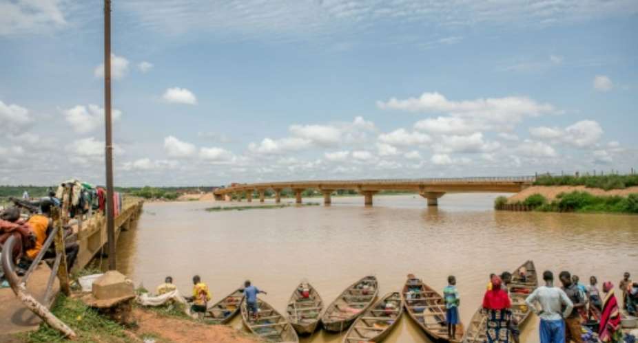 The Niger River divides Benin and Niger, shown here in the town of Malanville in 2023.  By - (AFP/File)