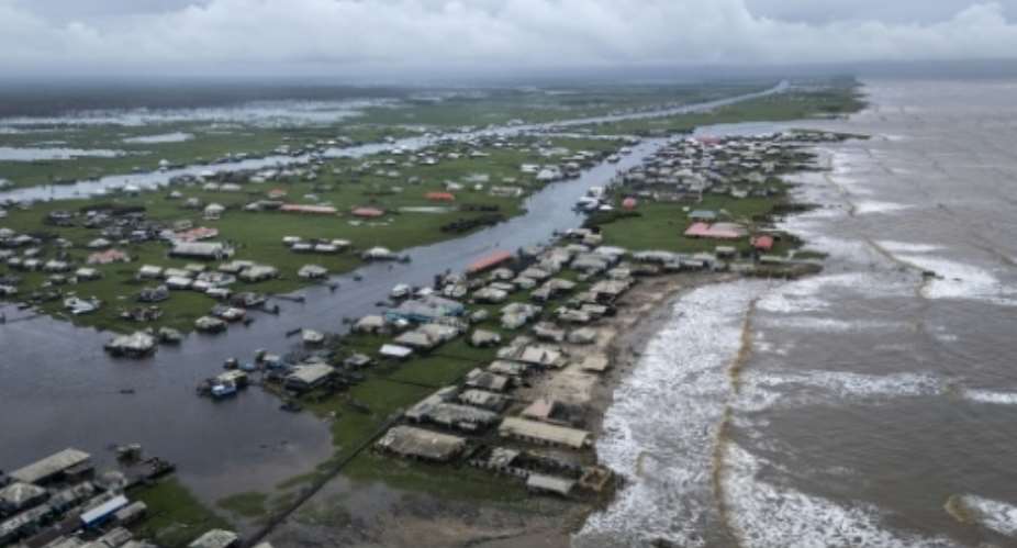 The Nigerian village of Ayetoro is disappearing into the Atlantic Ocean.  By OLYMPIA DE MAISMONT (AFP)