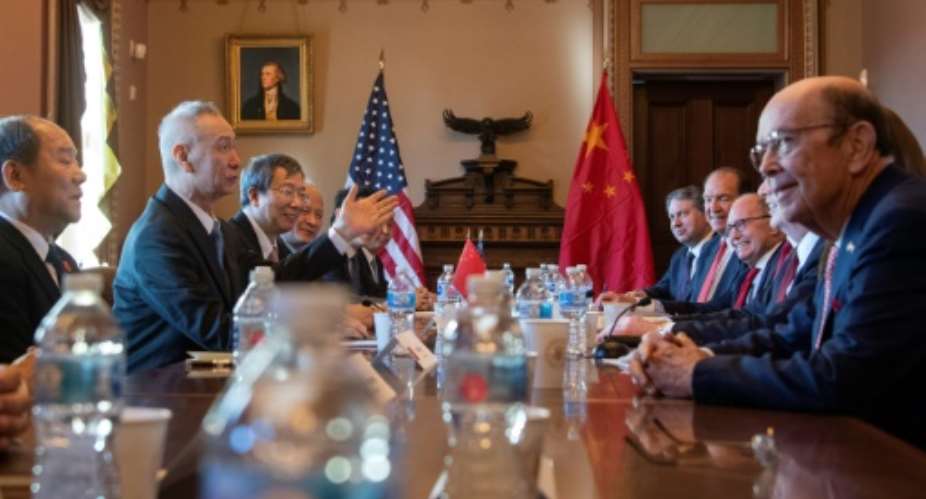 The ongoing trade battle between the US and China could have a negative impact of 0.7 percent of GDP from Africa through lack of trade and investment flows, according to a senior official at the African Development Bank.  By Jim WATSON AFPFile