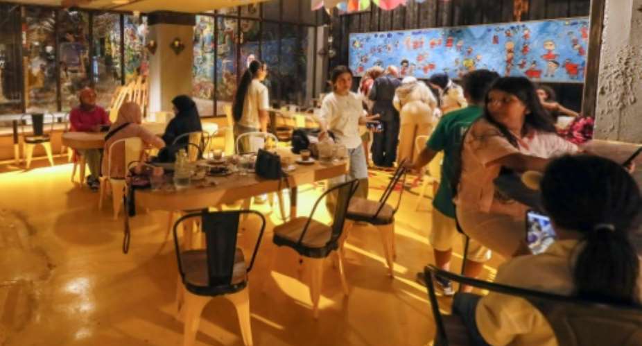 The owner of the Lamma cafe in the Libyan capital Tripoli says he opened it to to promote sustainability in a country recovering from years of war.  By Mahmud TURKIA (AFP)