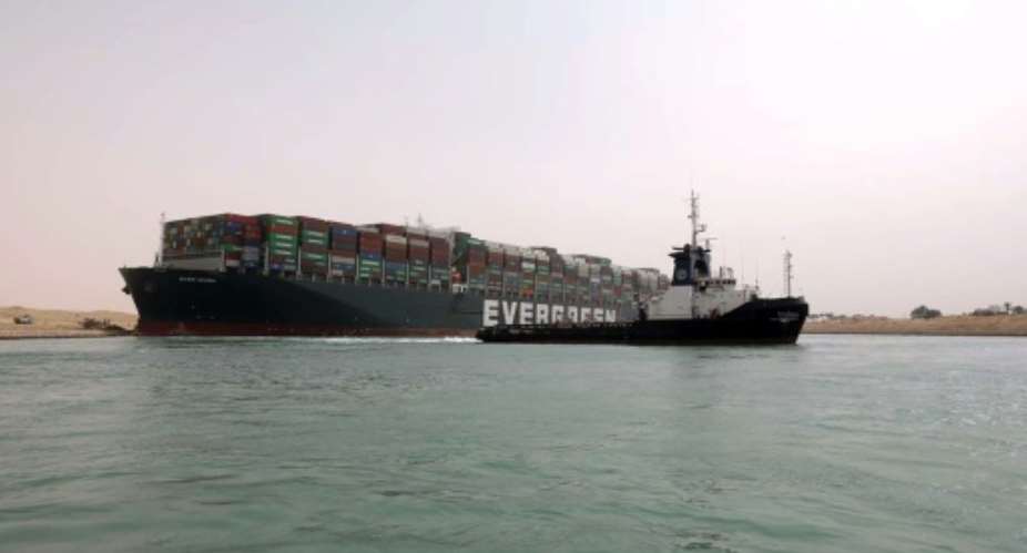 The Panama-flagged MV Ever Given got stuck on Tuesday.  By - Suez CANALAFP