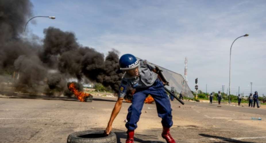 The police used tear gas on Monday in Harare and Bulawayo, Zimbabwe's second largest city, to disperse hundreds of protesters.  By Zinyange AUNTONY AFP