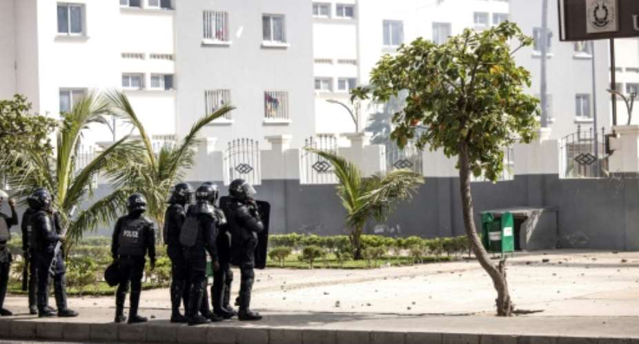 The police were deployed in numbers around Dakar university to deal with the students.  By JOHN WESSELS AFP