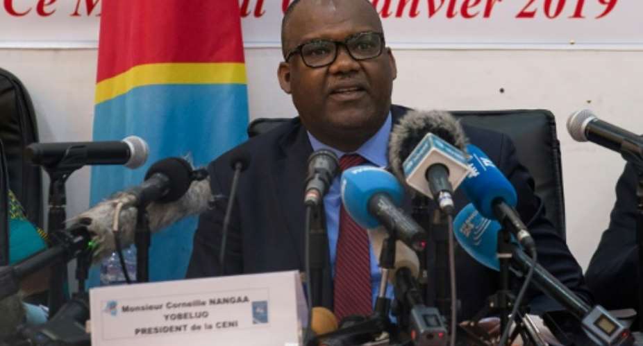 The president of DR Congo's Independent National Election Commission,  Corneille Nangaa, announces the provisional results of the presidential election in January 2019.  By Junior D. KANNAH AFPFile