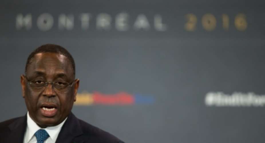The President of Senegal Macky Sall speaks at the opening of the Fifth Replenishment Conference of the Global Fund to Fight AIDS, Tuberculosis and Malaria in Montreal, Quebec, on September 16, 2016.  By Geoff Robins AFPFile