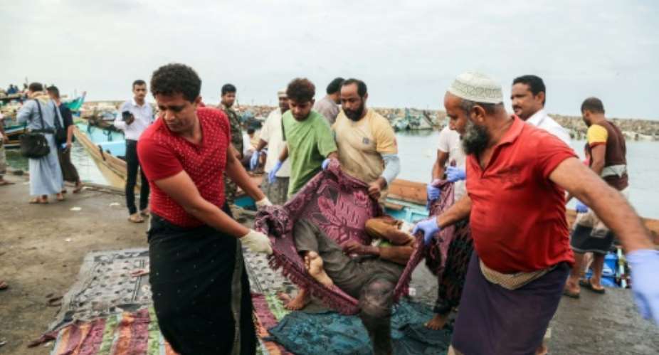 The refugees were hit by light weapons fire in waters off the rebel-held Yemeni port city of Hodeida.  By STR AFP