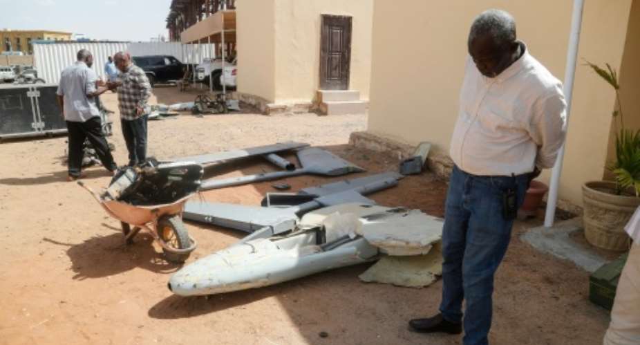The remains of a drone during a display of weapons reportedly seized by the Sudanese army, which it says were supplied to the RSF by foreign countries.  By Ebrahim HAMID (AFP)