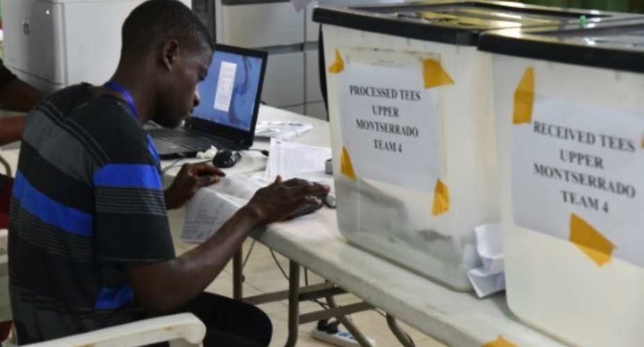 The results of Liberia's presidential elections have been delayed after hiccups on polling day, which included long queues at ballot stations and misdirections to voters. The election is a vital barometer of the country's stability.  By ISSOUF SANOGO AFP