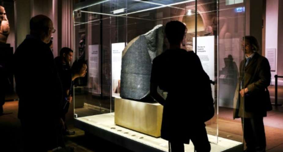The Rosetta Stone, discovered by French troops and housed today at the British Museum, unlocked the study of ancient Egypt.  By Amir MAKAR AFPFile