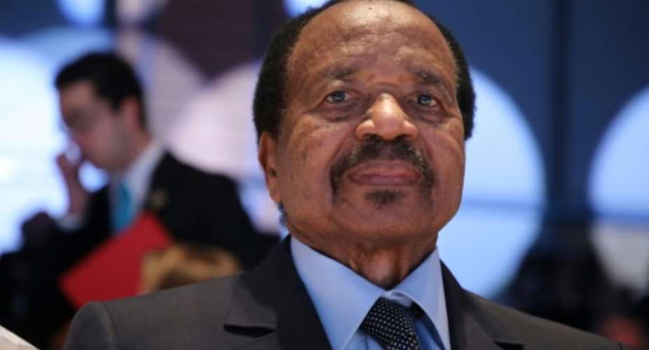The RSF described Wazizi's death as the country's worst assault on journalists in a decade; pictured is an October 2019 file image of President Paul Biya.  By Ludovic MARIN AFPFile