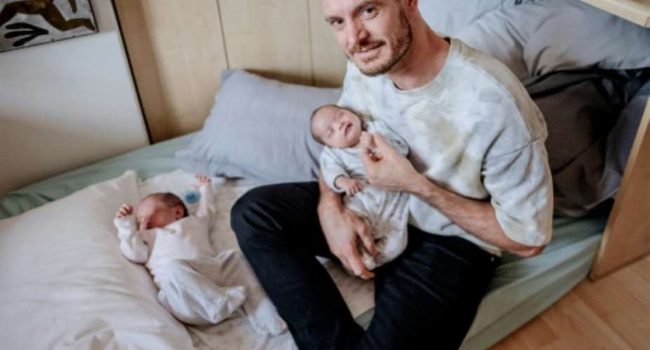 The ruling is a major blow and a major disappointment, said Phillip Luehl, shown here with the twins.  By LUCA SOLA AFPFile