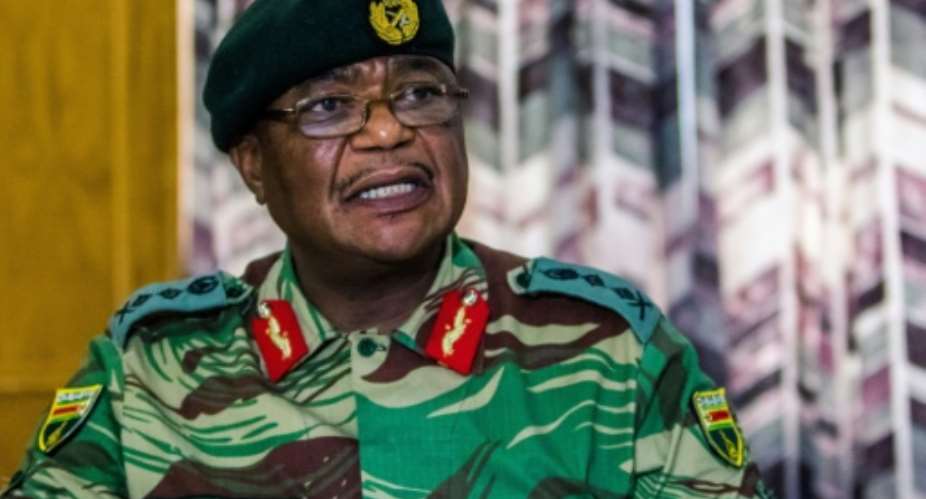 The ruling ZANU-PF party accused army chief General Constantino Chiwenga of treasonable conduct after he criticised Mugabe for sacking vice president Emmerson Mnangagwa..  By Jekesai NJIKIZANA AFPFile