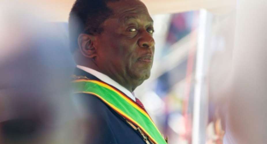 The ruling ZANU-PF party, which has held power since independence in 1980, easily won the parliamentary vote on July 30, 2018, while President Emmerson Mnangagwa pictured August 2018 won the presidency with just over 50 percent of the vote.  By Jekesai NJIKIZANA AFPFile