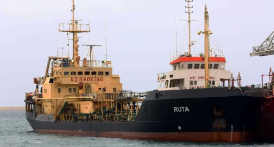 The Ruta oil tanker flying the Ukranian flag, is seen at the Tripoli seaport on April 29, 2017, after it was seized by the Libyan navy.  By MAHMUD TURKIA AFP