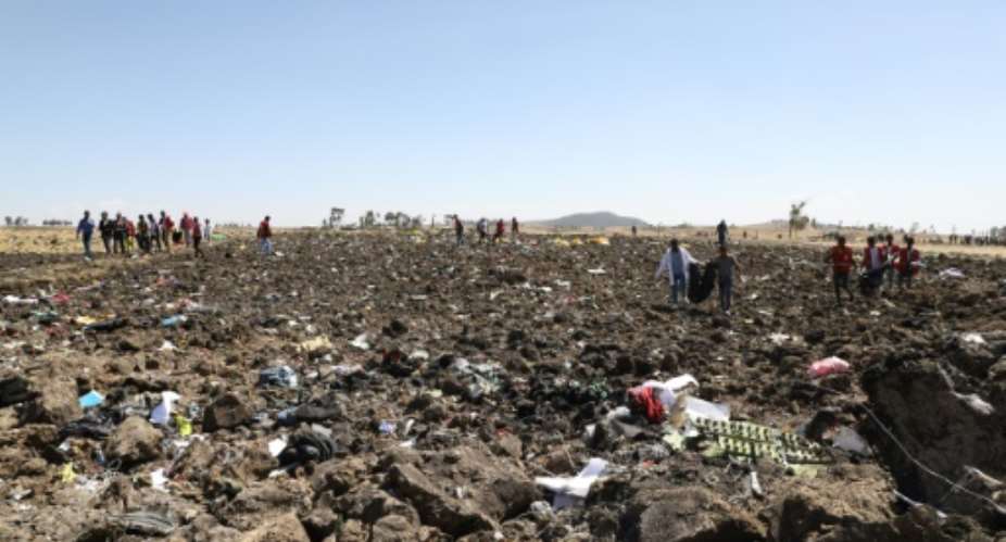 The scene of devastation where the Nairobi-bound Ethiopian Airlines plane came down.  By Michael TEWELDE AFP