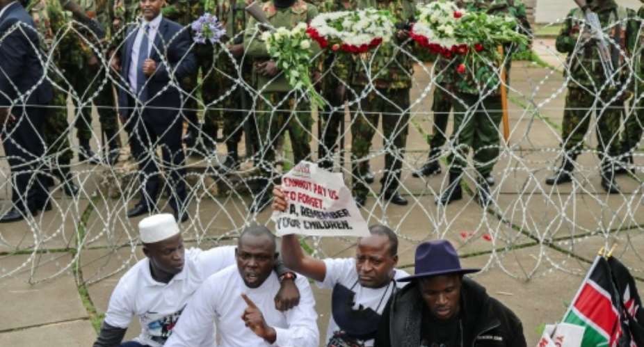 The six protesters were arrested outside parliament and had remained incommunicado since Thursday.  By Tony KARUMBA (AFP)