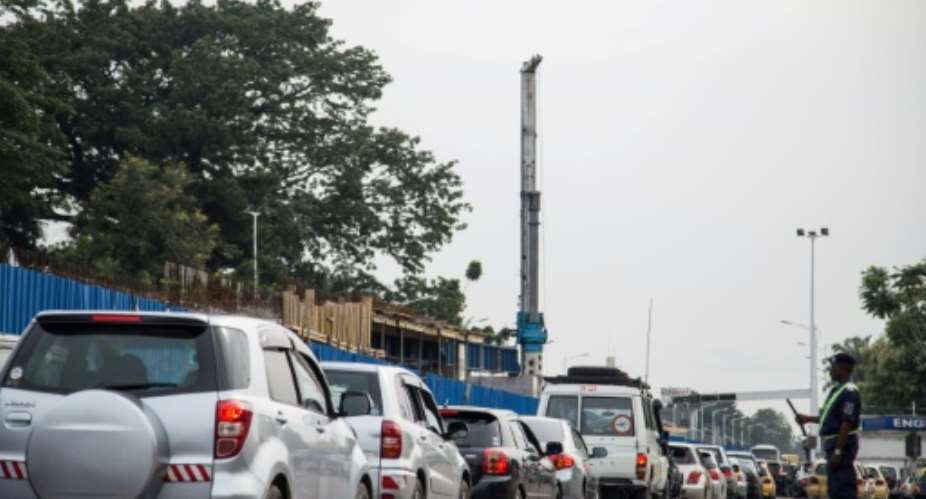 The slow pace of reform in DR Congo has sparked traffic jams on arterial roads.  By Junior KANNAH AFPFile