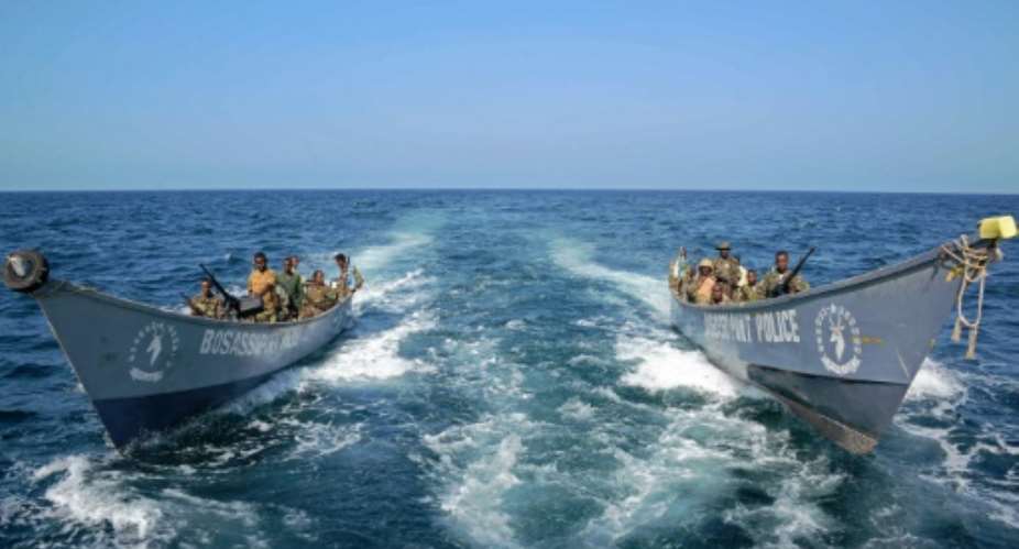 The Somali coast guard carry out a patrol off the coast of Bosaso in Puntland on November 19, 2013.  By Mohamed Abdiwahab AFPFile