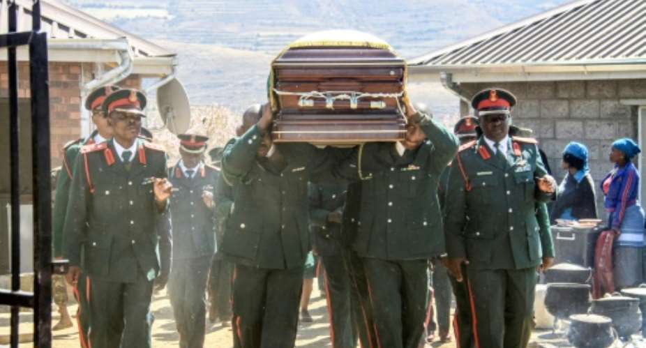 The Southern African Development Community (SADC), a regional bloc, deployed a force after Lesothos Army Lieutenant General Khoantle Motsomotso (funeral pictured October 2017) was shot dead in barracks by officers from a perceived rival faction.  By SAMSON MOTIKOE (AFP/File)