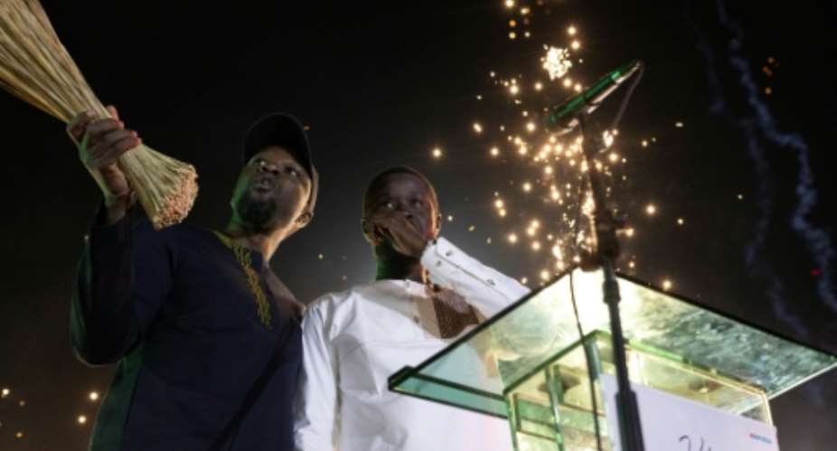 The spark may have gone out in Senegals President Bassirou Diomaye Faye (R)s relationship with his mentor, Prime Minister Ousmane Sonko (L).  By MARCO LONGARI (AFP/File)