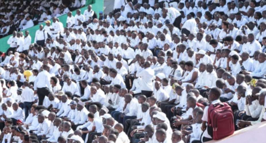 The stadium in Gitega where the funeral ceremony is to be held was packed with citizens from across the country, all dressed in white at the request of authorities.  By TCHANDROU NITANGA AFP