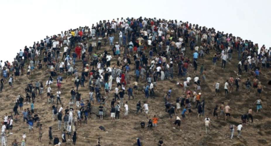 The sudden massive influx sparked an international crisis.  By Abdel Majid BZIOUAT (AFP)