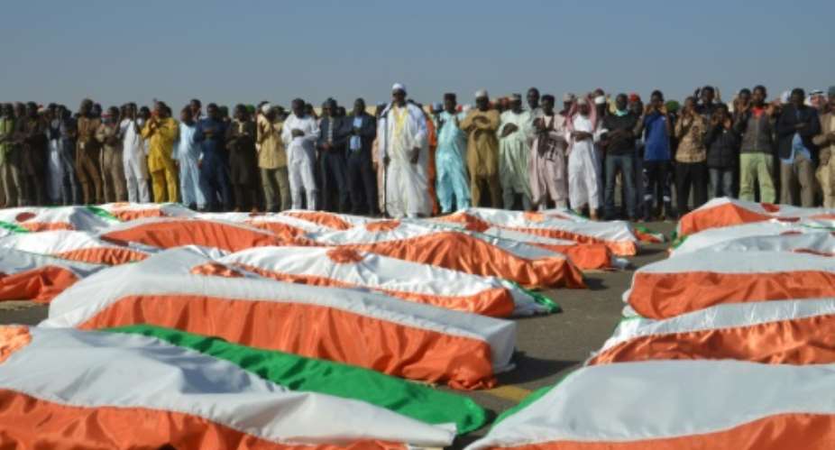 The summit announcement came a day after Niger's military buried its dead.  By BOUREIMA HAMA AFP